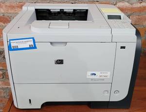 lot 89 image: HP LASERJET P3015 PRINTER AS SHOWN.