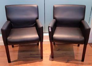 lot 99 image: (2) LEATHERETTE STYLE OFFICE CHAIRS IN STYLE, COLOR, AND CONDITION SHOWN. APPROX. 25 W x 26 D x 35 H. (SOLD 2X THE MONEY)