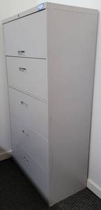 lot 100 image: 4-DRAWER METAL LATERAL FILING CABINET AS SHOWN. APPROX. 36 W x 18 D x 64 H.