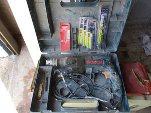 lot 131 image: Bosch -110-V,  12-34 Electric Hamer Drill In Case With Chuck Key And Bits