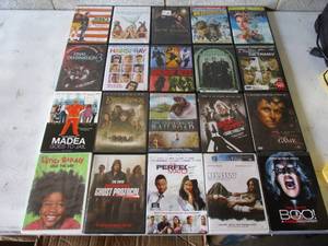 lot 22 image: 20-Mixe Titles DVDs Moves