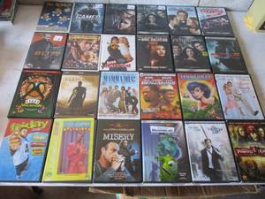 lot 40 image: 24 Mixed Titles DVDs In Cases