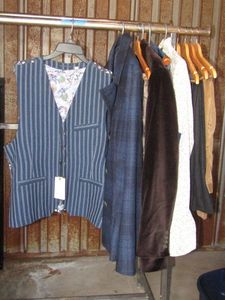 lot 76 image: Mens formal clothes, including Robert Graham vest and jacket, Redaelli jacket, Thomas Dean longsleeve button-up shirt, Polo Ralph Lauren pants, and more