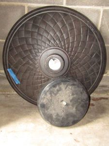 lot 86 image: Metal patio umbrella base and Ikea patio umbrella base