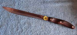 lot 10 image: CUTCO 1023 Meat CARVER KNIFE 9 Serrated Blade Brown Swirl Handle