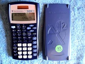 lot 33 image: Texas Instrument TI 30x IIS Scientific Calculator w Cover
