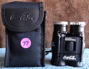 lot 77 image: COOL FIND - Vintage Bushnell Coca-Cola Bottle Shaped Compact Binoculars (8x21), 1997