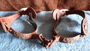 lot 95 image: AMAZING FIND CUSTOM SPURS WITH THE NAME KEVIN KOLB (NFL QUARTERBACK) STEVENVILLE, TX
