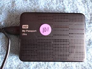lot 101 image: MY PASSPORT ULTRA External Hard Drive, 1 TB, USB 3.2, Black - $$$