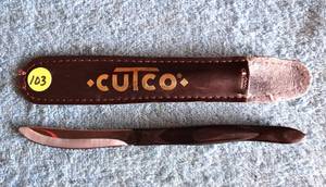 lot 103 image: CUTCO #1759 KB Black Handle Serrated Steak Table Knife