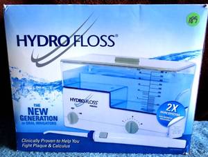 lot 189 image: Hydro Floss Hydromagnetic Dental Oral Irrigator w4 Color Coated Tips Included - UNUSED IN BOX
