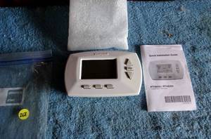 lot 268 image: Honeywell Programmable Thermostat RTH6350 D1000 With Owners Manual