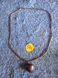 lot 314 image: SILVER TONED HEART SHAPE PENDANT NECKLACE