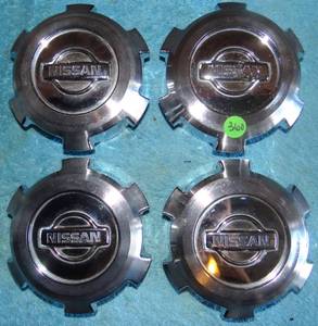 lot 360 image: ORIGINAL FACTORY STOCK - NISSAN CENTER WHEEL COVER CAP (LOT OF 4) - SEE PIC 2 FOR PART NUMBERS