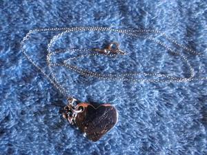 lot 369 image: A MILLION LITTLE LESSONS OF LOVE HEART PENDANT WITH NECKLACE - STAMPED .925
