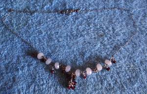lot 371 image: DELICATE WHITE STONE & RED JEWEL NECKLACE