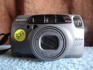 lot 377 image: Pentax IQ Zoom 160 Point and Shoot 35mm Film Camera Gray