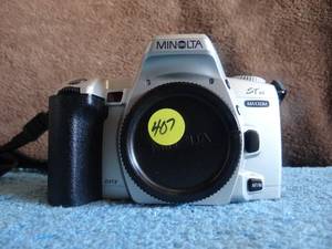 lot 407 image: VINTAGE Minolta ST si Maxxum SLR 35mm Film Camera with Quantaray Lens 28-105mm
