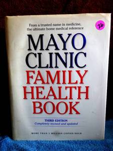 lot 26 image: MAYO CLINIC FAMILY HEALTH HARDBACK BOOK - GREAT INFORMATION W PHOTOS