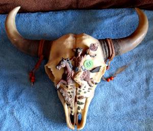 lot 33 image: NATIVE AMERICAN WALL HANGER - SKULL WITH INIDAN RIDER ON HORSE