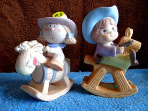 lot 43 image: VINTAGE BUMPKINS BOY GIRL RIDING BARREL HORSES BY FABRIZIO - $$