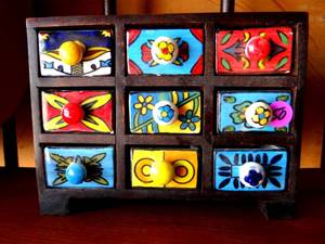 lot 50 image: UNIQUE 9 DRAWER COLORFUL CERAMIC & WOOD STORAGE BOX - APPROX 8-10 