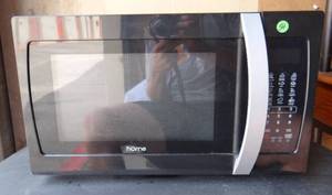 lot 54 image: HOME Countertop Microwave Oven - 1.3 Cu. Ft., 1050W, Black with One-Touch Cook Functions, Dishwasher Safe Turntable and 10 Adjustable Power Settings