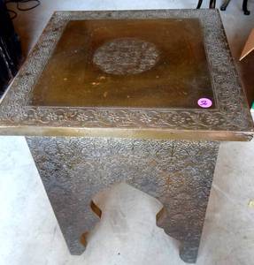 lot 56 image: WORLD MARKET MOROCCAN THEMED TABLE WITH ORNATE CARVINGS - ORIG PRICE $199.95