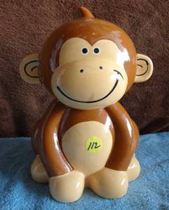lot 112 image: CUTE 8  TALL MONKEY BANK WITH STOPPER