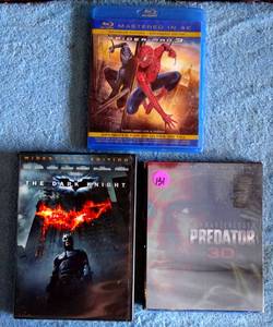 lot 131 image: BATMAN, THE DARK KNIGHT, SPIDERMAN 3, & PREDATOR 3D DVD MOVIES