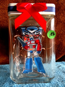 lot 182 image: AWESOME TRANSFORMERS CUSTOM MADE LIGHTED JAR