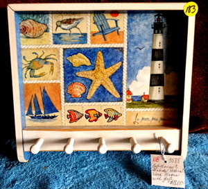 lot 183 image: SEASIDE WOOD PLAQUE WITH HANGING PEGS