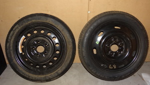 lot 206 image: PAIR OF EMERGENCY SPARE TIRES - SEE PICS FOR SIZES