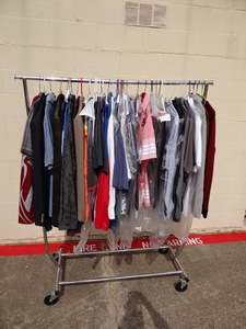 lot 234 image: ROLLING CLOTHES RACK WITH 40-50 EXCELLENT QUALITY SHIRTS, PANTS, & JACKETS - ALL DRYCLEANED