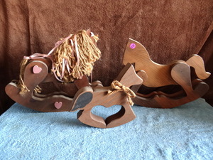 lot 235 image: LOT OF THREE WOODEN ROCKING HORSES