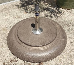 lot 193 image: Tuuci Mobile Umbrella Stand, These Are Expensive