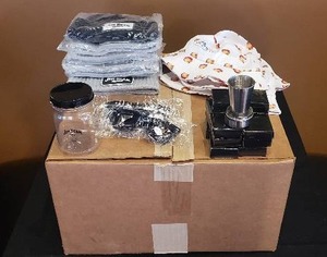 lot 272 image: Large Lot of Jim Beam Merchandise - 68 Plastic Jars, 6 Beanies, 3 Bucket Hats, 2 Sunglasses, 15 Metal Collapsible Travel Shot Glasses