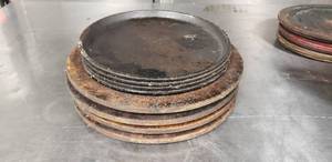 lot 21 image: Lot of 4 Cast Iron Circle Sizzler Plates with 4 Wood Underliners