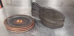 lot 22 image: Lot of 11 Cast Iron Oval Sizzler Plates with 3 Wood Underliners