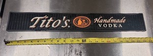 lot 57 image: Titos Vodka 22.5 Bar Mat