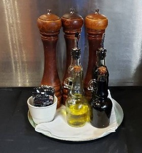 lot 89 image: Pepper Grinders, Balsamic Vinegar, and Olive Oil