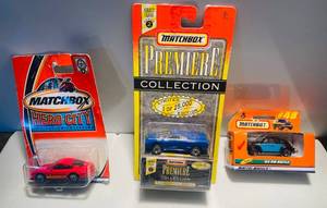 lot 41 image: Matchbox Cars Porsche 911 Turbo, Premier Collection Lamborghini Diablo and 62 VW Beetle