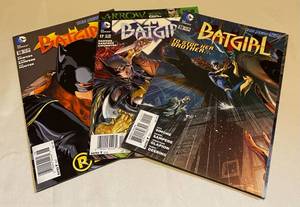 lot 51 image: 3 Batgirl DC Comics Comic Books Editions 17, 18, and 19