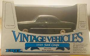 lot 52 image: ERTL Vintage Vehicles 1949 Ford Coupe 143 Die Cast Replica