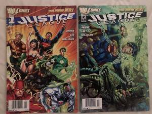 lot 164 image: Justice League DC Comic Books #1 and #2