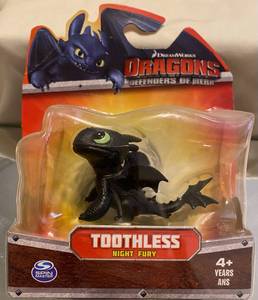 lot 296 image: Defenders of Berk DreamWorks Animation Toothless Night Fury Figurine unopened package