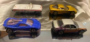 lot 330 image: Hot Wheels 1990 Blue Car 1996 White Corvette 1996 Gold Corvette 1990 Car