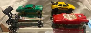 lot 331 image: Hot Wheels 1995 65 Impala 1994 Yellow Taxi 1994 Dragster 1993 Red Corvette