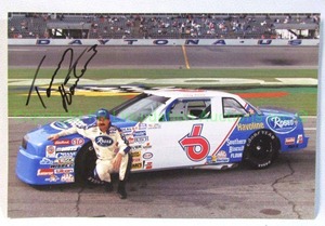 lot 48 image: Signed Tommy Houston Roses discount tire store data card