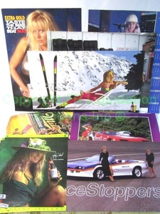 lot 80 image: Girls of racing posters including Kathy Ireland and more